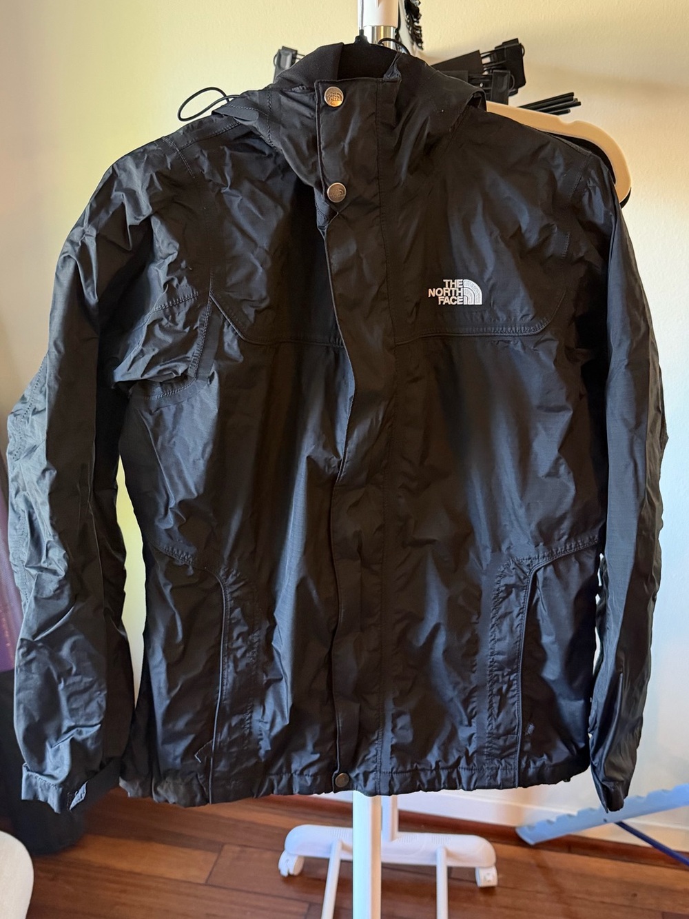 The North Face Women’s Black Rain Shell, size Medium